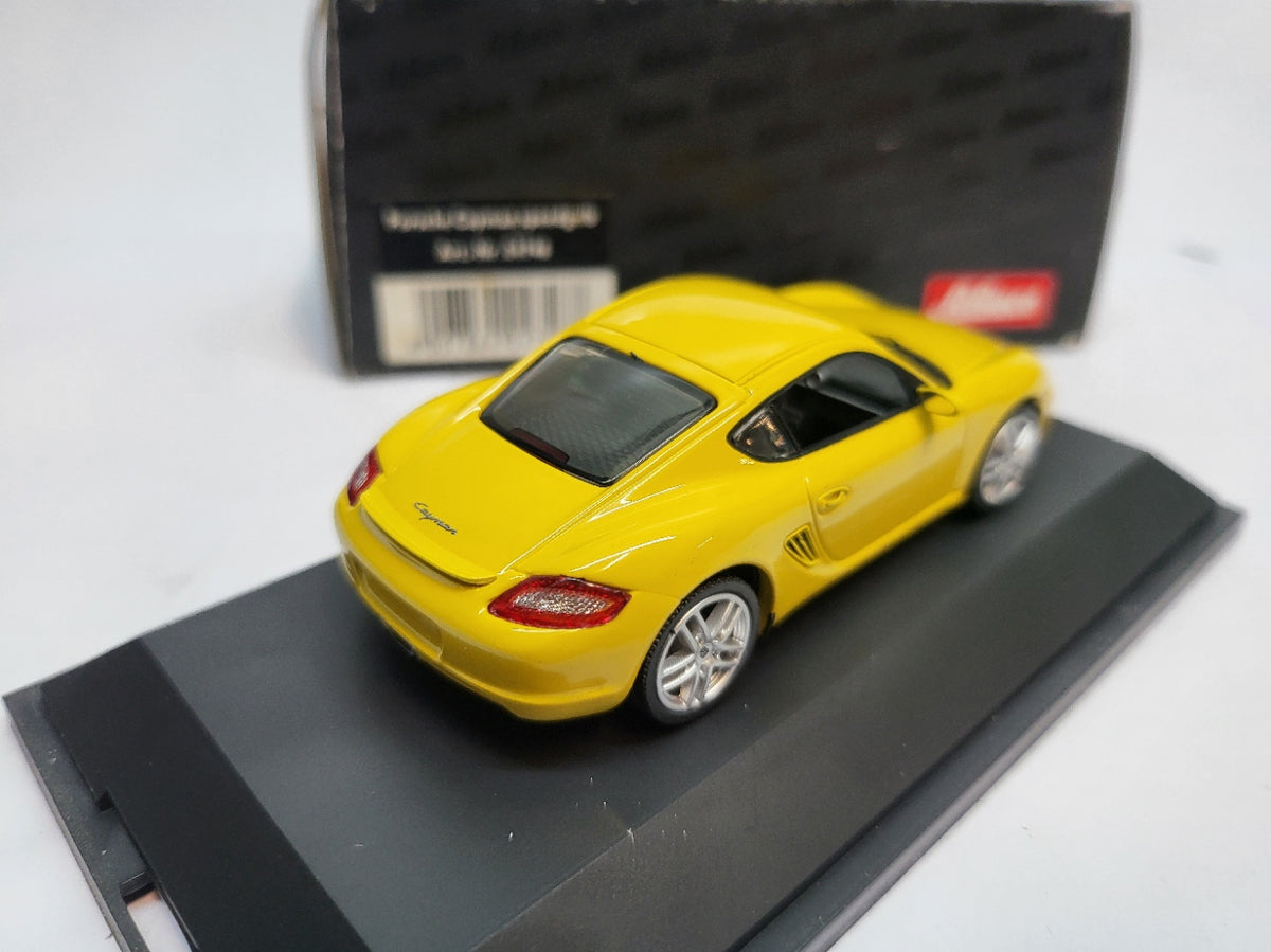 Schuco Porsche Cayman Speed Yellow - Schaal 1:43