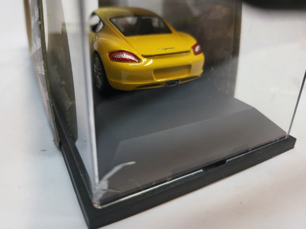 Schuco Porsche Cayman Speed Yellow - Schaal 1:43
