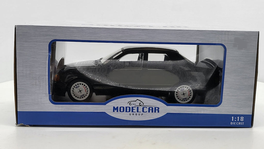 MCG: Ford Sierra Cosworth Zwart Metallic - Schaal 1:18