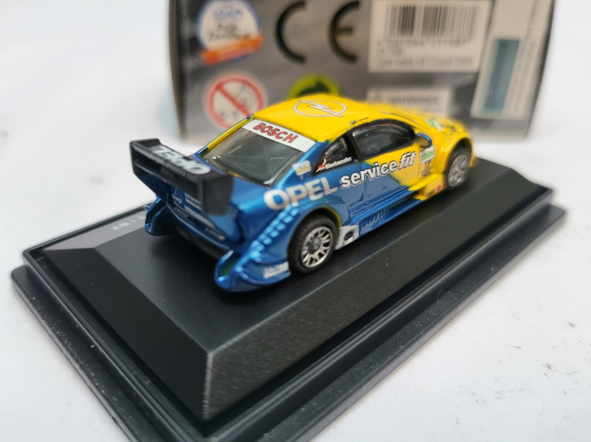 Opel Astra V8 Coupé Geel/Blauw 2003 Jeroen Bleekemolen - Schuco 1:87