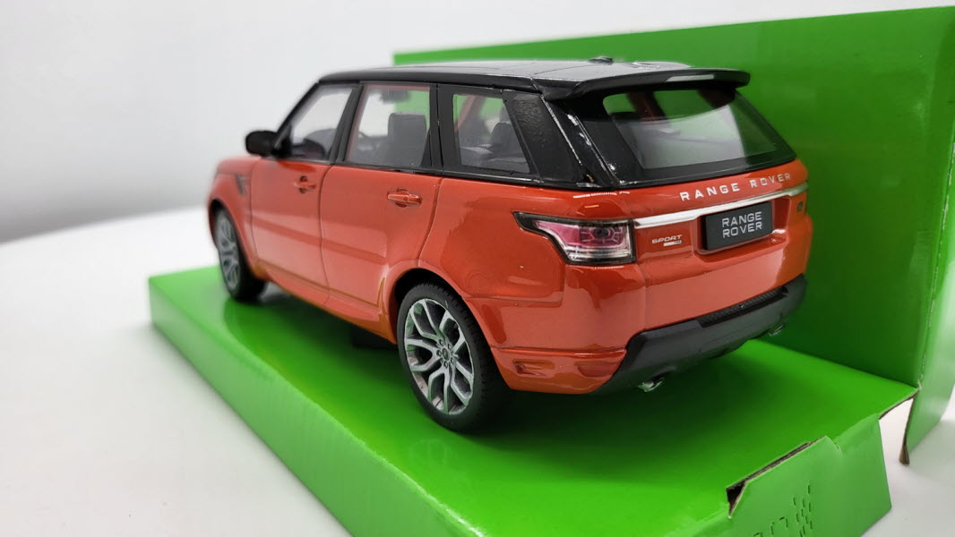 Welly: Land Rover Range Rover Sport Donkeroranje/Zwart - Schaal 1:24