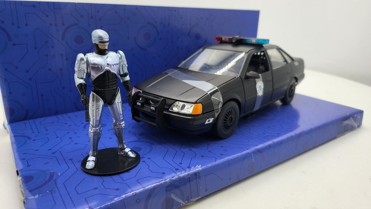 Ford Taurus Detroit Police RoboCop Zwart - Jada Toys 1:24