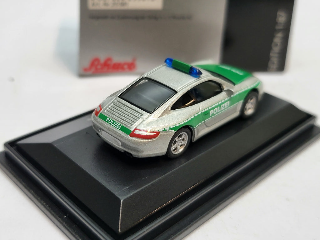 Porsche 911 Carrera S Coupé Polizei Groen/Grijs - Schuco 1:87