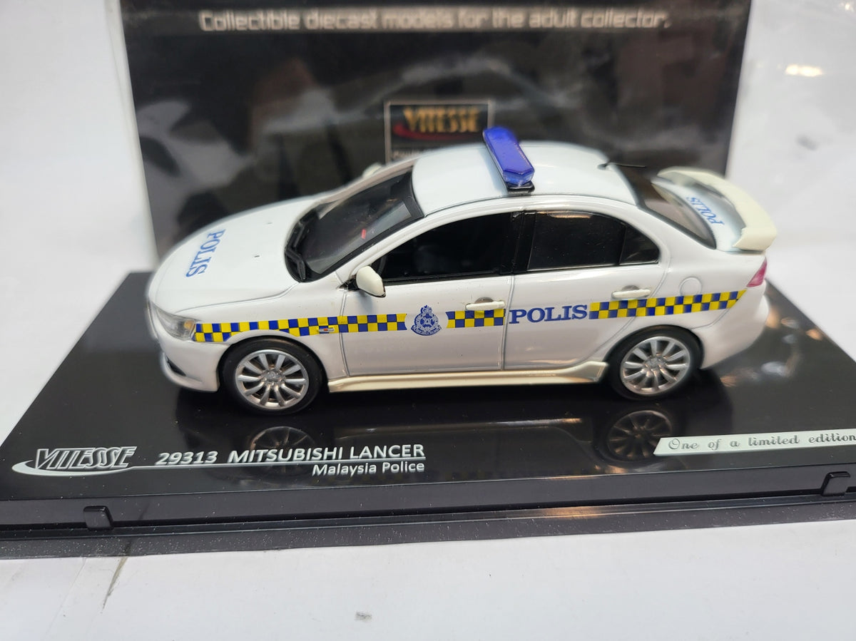 Vitesse Mitsubishi Lancer Maleisië Politie Wit  - Schaal 1:43