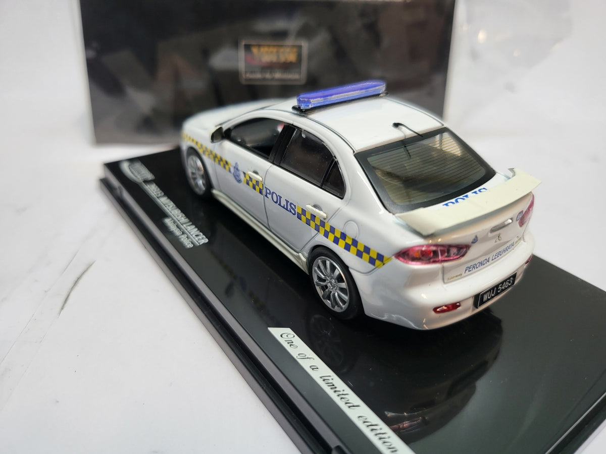 Vitesse Mitsubishi Lancer Maleisië Politie Wit  - Schaal 1:43