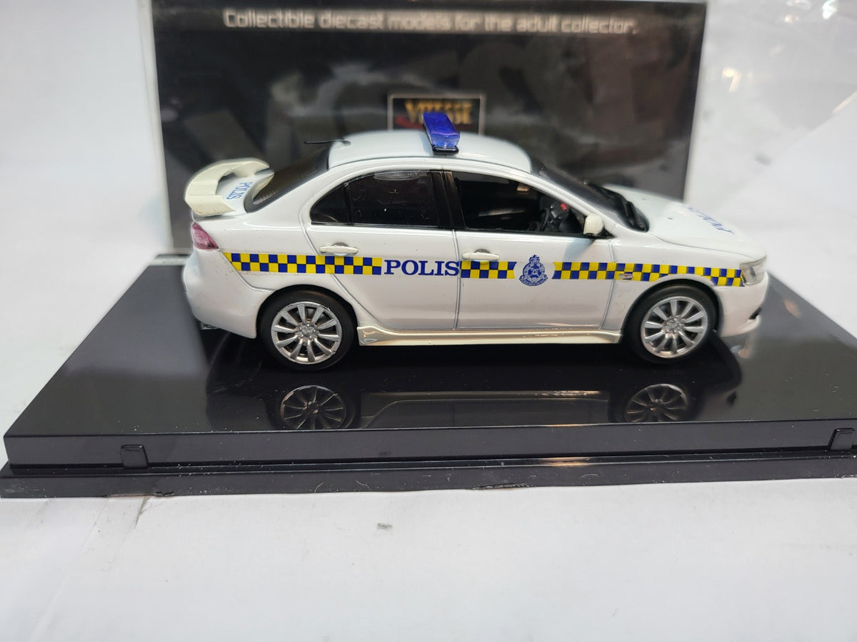 Vitesse Mitsubishi Lancer Maleisië Politie Wit  - Schaal 1:43