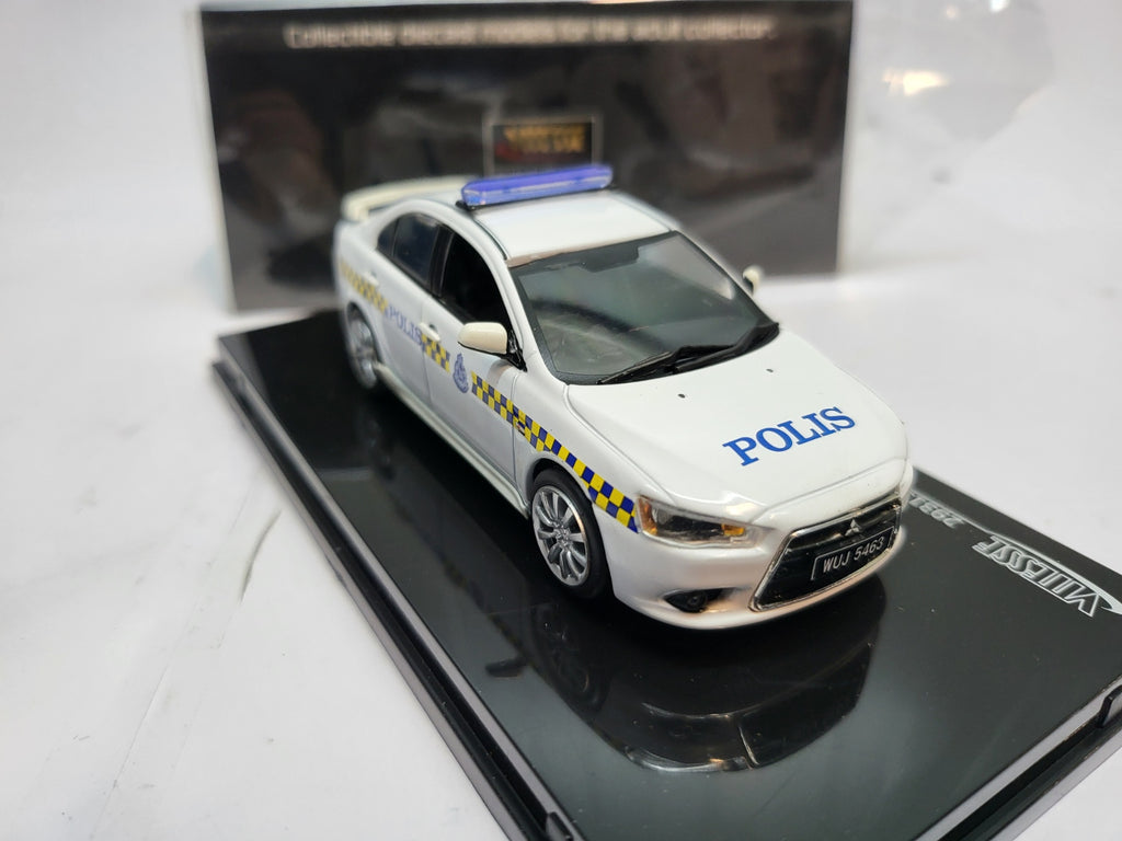 Vitesse Mitsubishi Lancer Maleisië Politie Wit  - Schaal 1:43