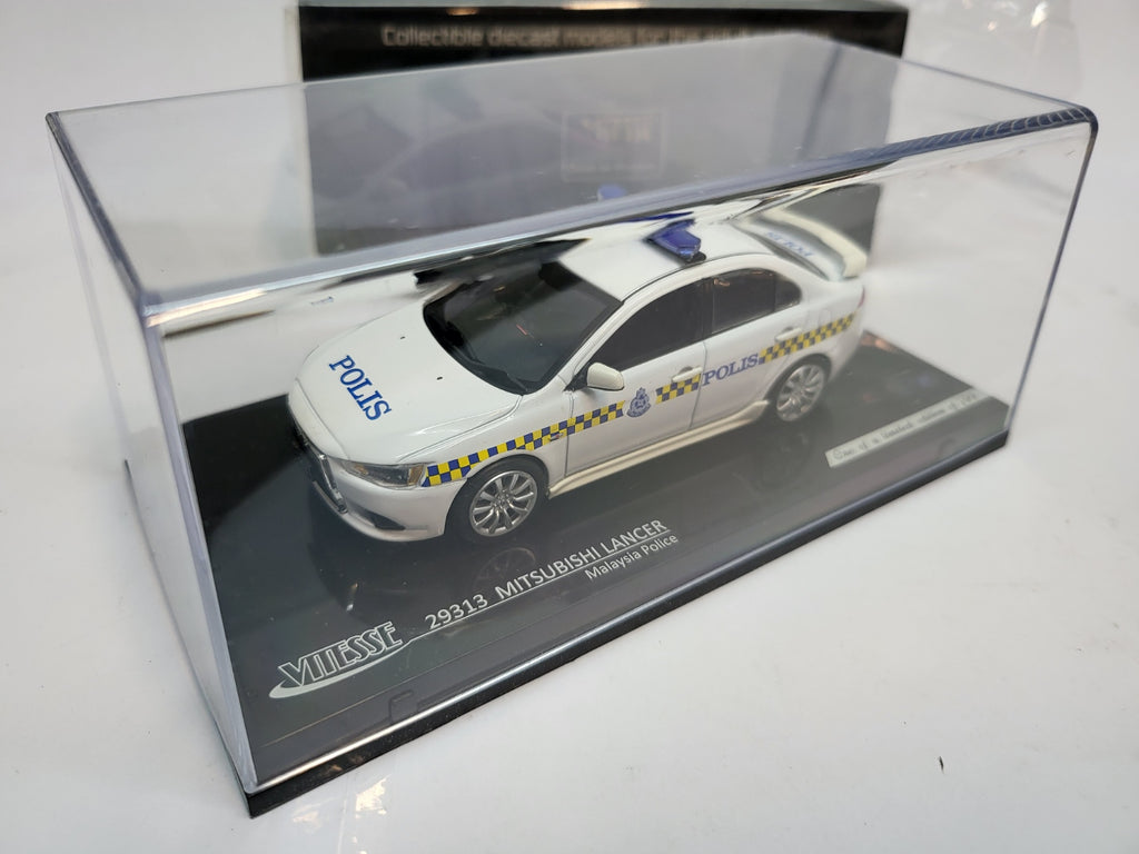 Vitesse Mitsubishi Lancer Maleisië Politie Wit  - Schaal 1:43
