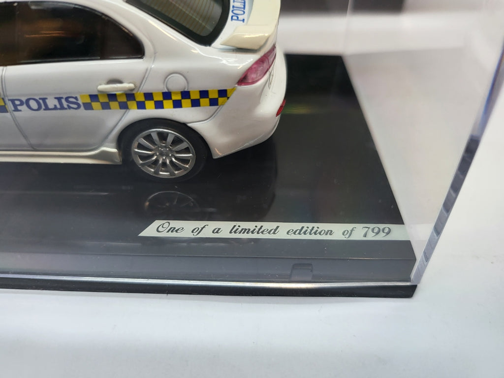 Vitesse Mitsubishi Lancer Maleisië Politie Wit  - Schaal 1:43