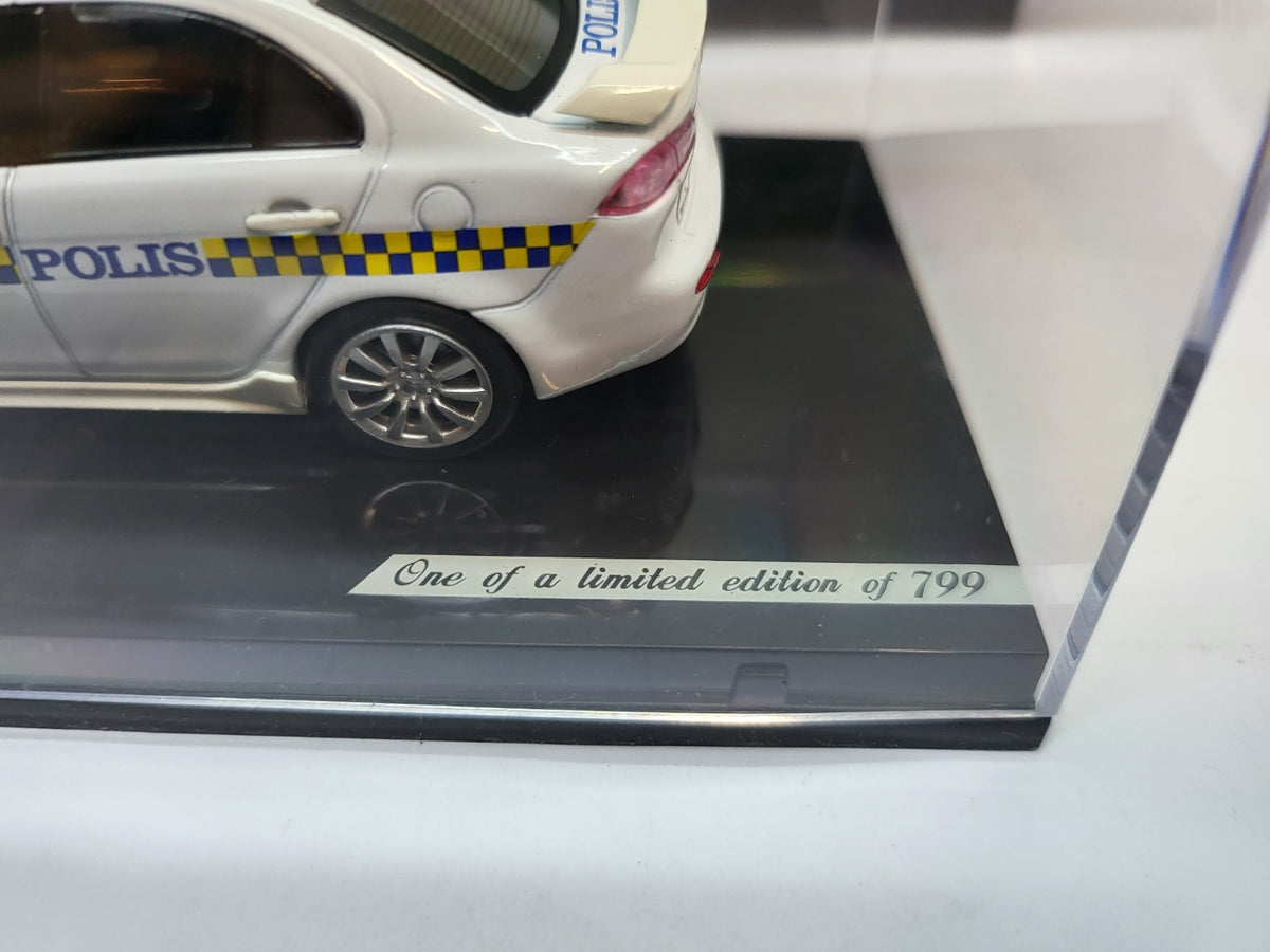 Vitesse Mitsubishi Lancer Maleisië Politie Wit  - Schaal 1:43