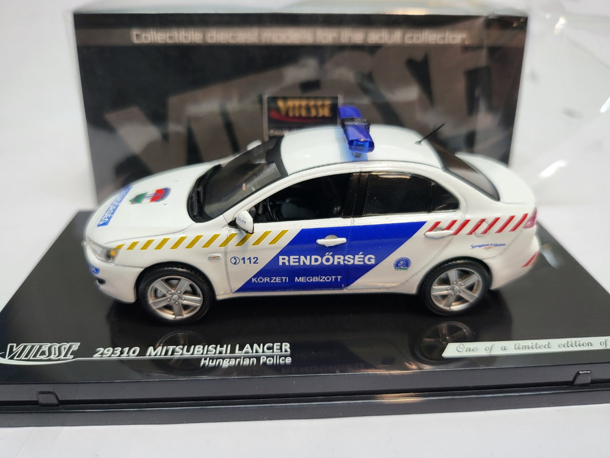 Vitesse Mitsubishi Lancer Hongarije Politie Wit/Blauw - Schaal 1:43