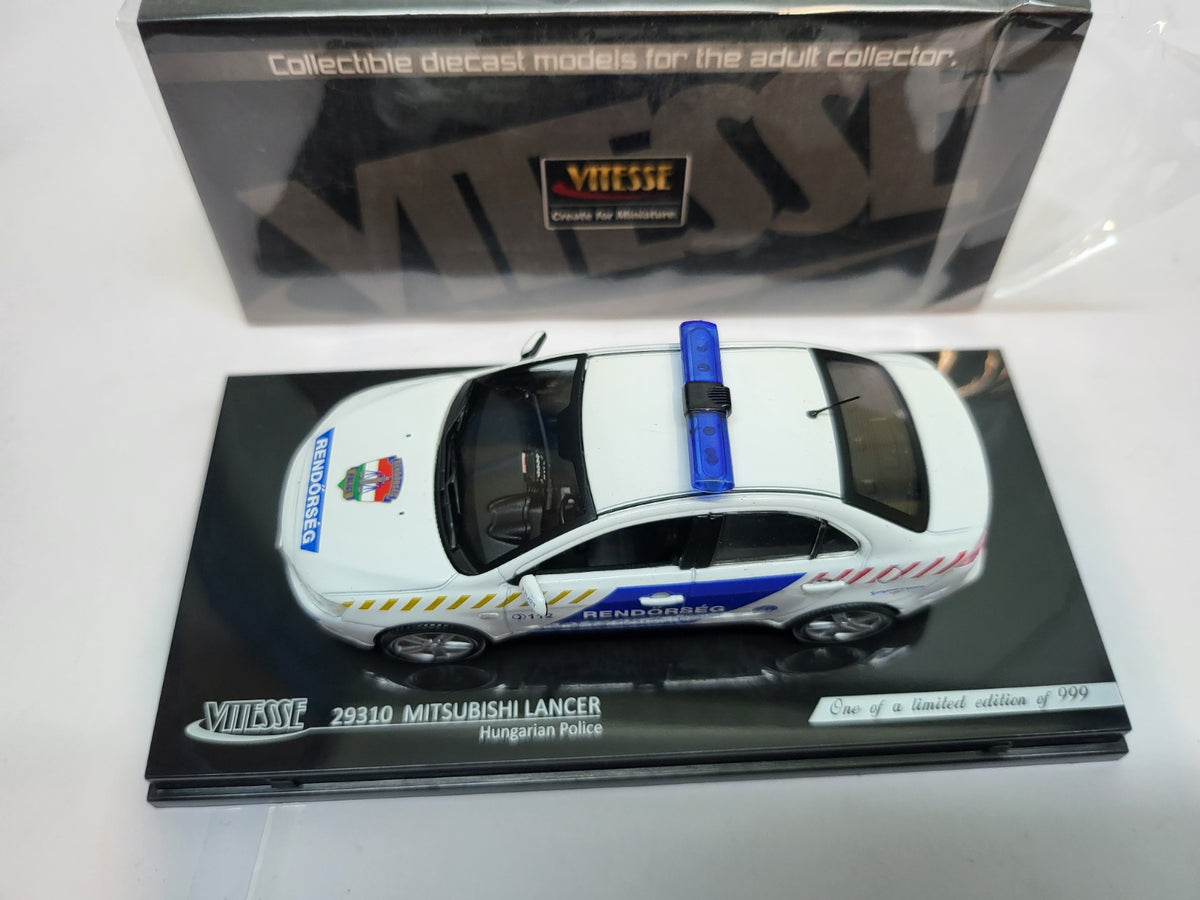 Vitesse Mitsubishi Lancer Hongarije Politie Wit/Blauw - Schaal 1:43