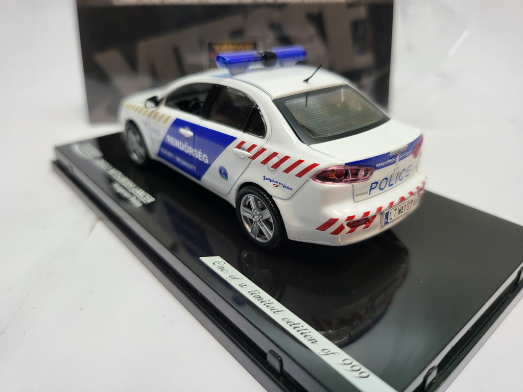 Vitesse Mitsubishi Lancer Hongarije Politie Wit/Blauw - Schaal 1:43