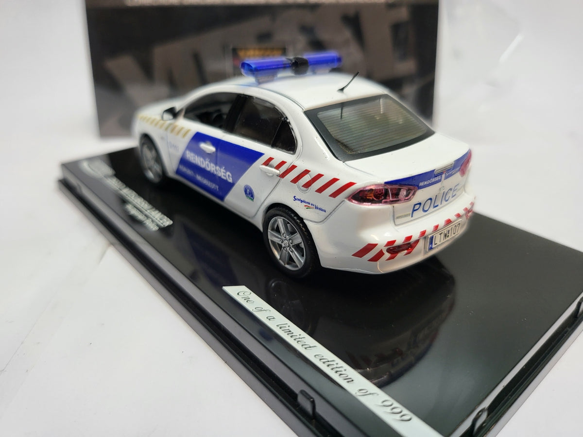 Vitesse Mitsubishi Lancer Hongarije Politie Wit/Blauw - Schaal 1:43