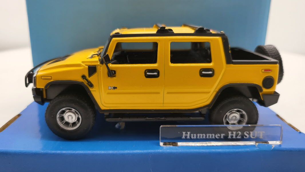 Cararama: Hummer H2 SUT Geel - Schaal 1:43