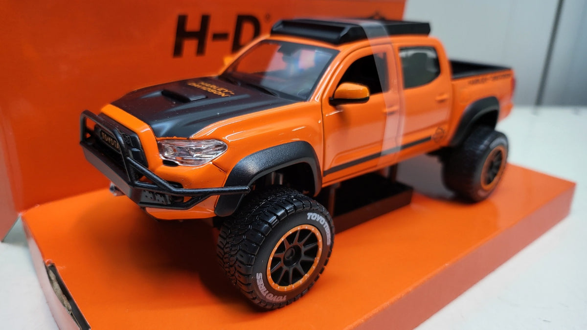 Maisto Toyota Tacoma TRD Pro, oranje/zwart, 2023 - Schaal 1:24