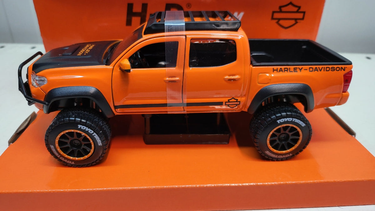 Maisto Toyota Tacoma TRD Pro, oranje/zwart, 2023 - Schaal 1:24