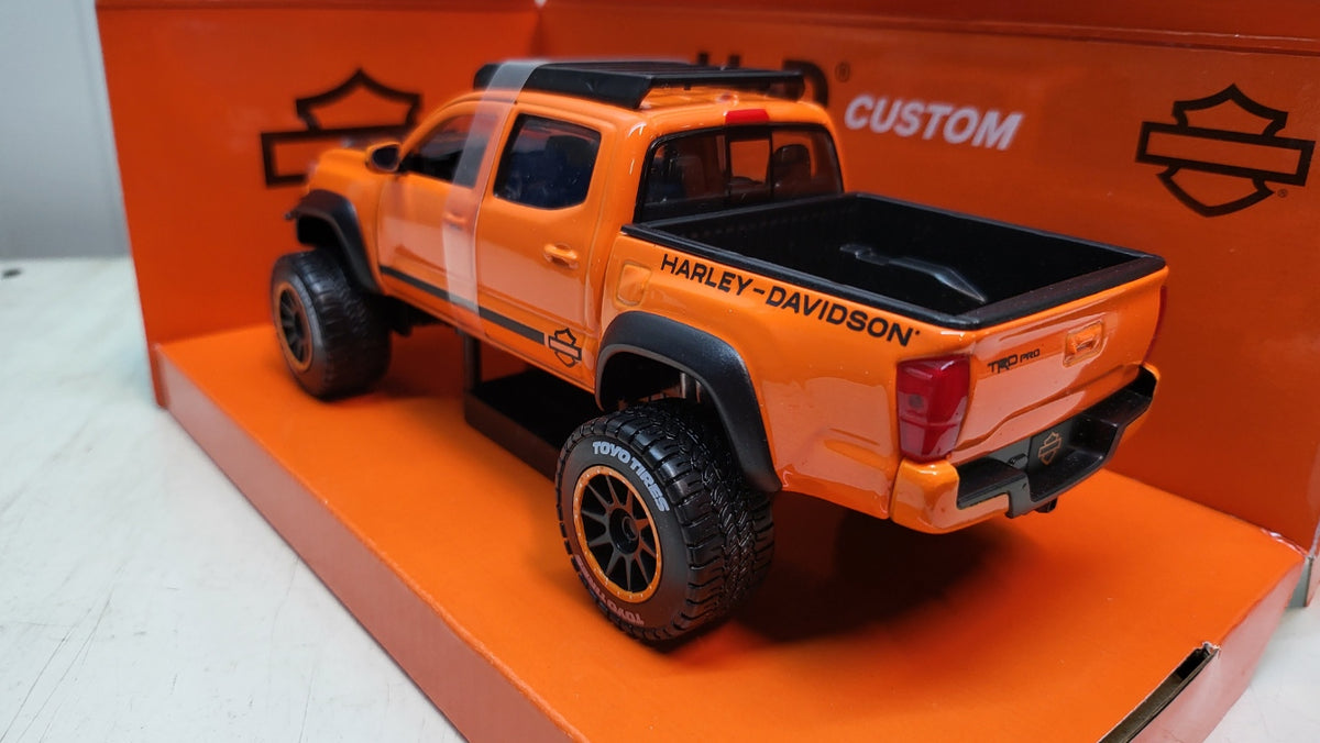 Maisto Toyota Tacoma TRD Pro, oranje/zwart, 2023 - Schaal 1:24