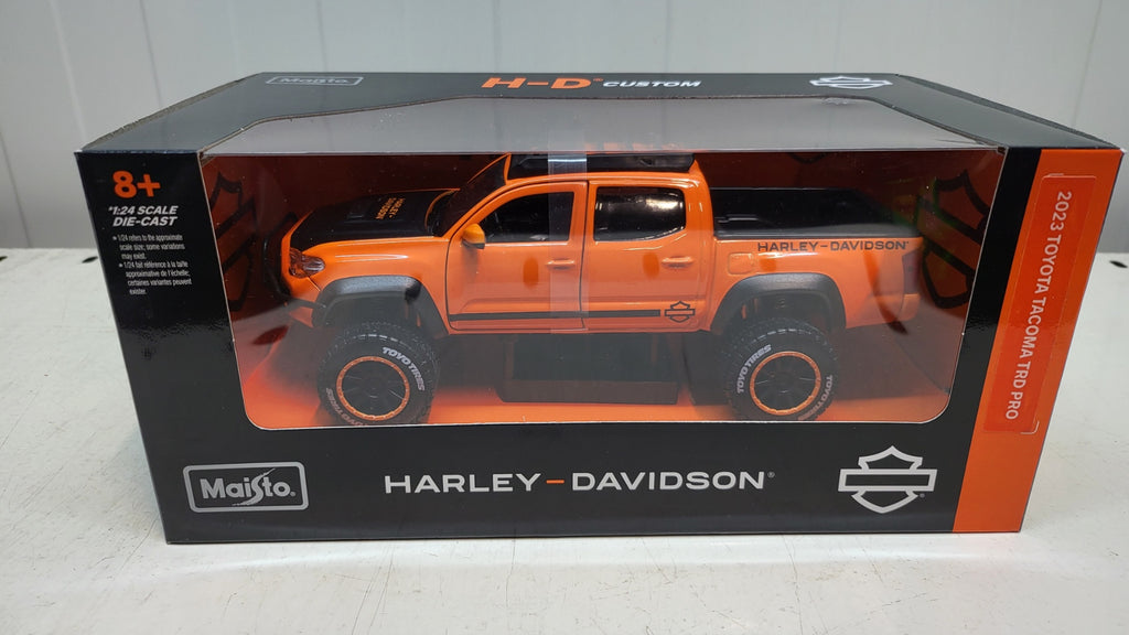 Maisto Toyota Tacoma TRD Pro, oranje/zwart, 2023 - Schaal 1:24