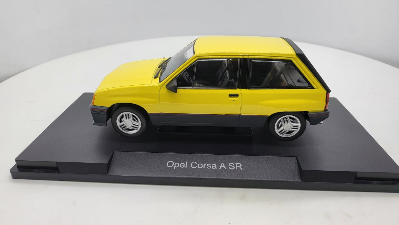 MCG: Opel Corsa A SR Geel (1982) - Schaal 1:18