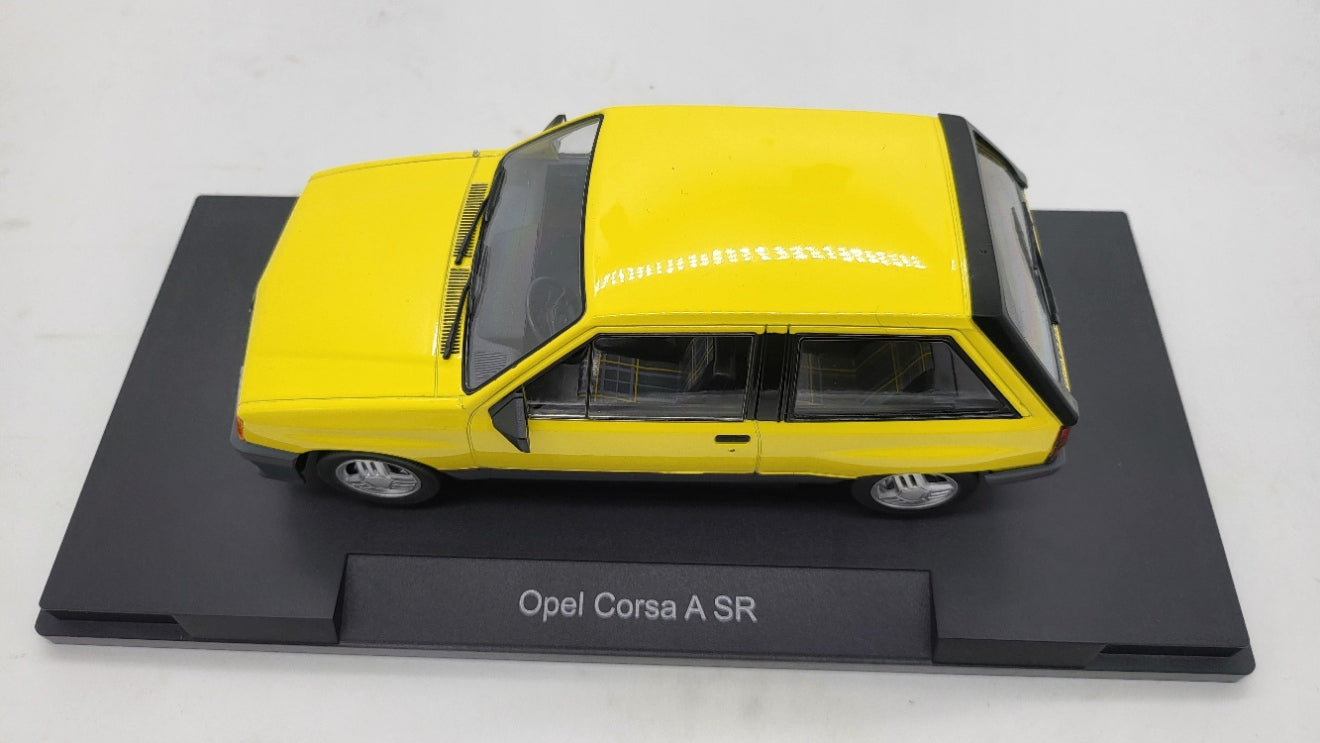 MCG: Opel Corsa A SR Geel (1982) - Schaal 1:18