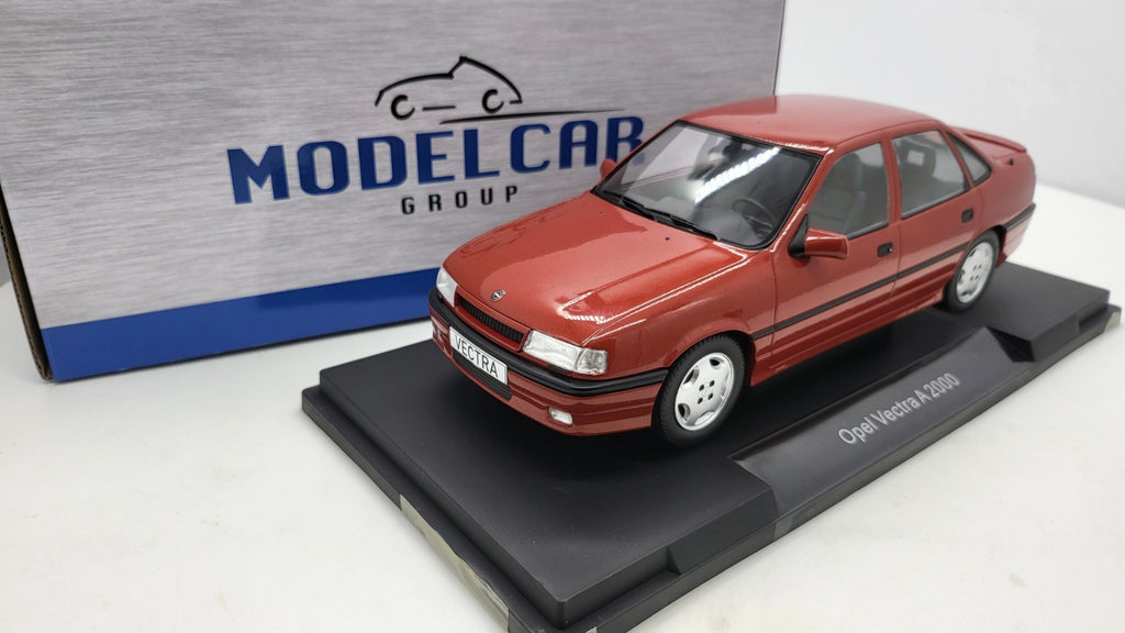 MCG: Opel Vectra A 2000 Bordeaux Rood Metallic (1990) - Schaal 1:18