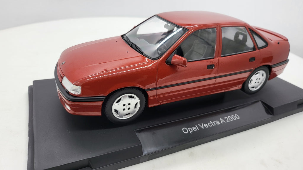 MCG: Opel Vectra A 2000 Bordeaux Rood Metallic (1990) - Schaal 1:18