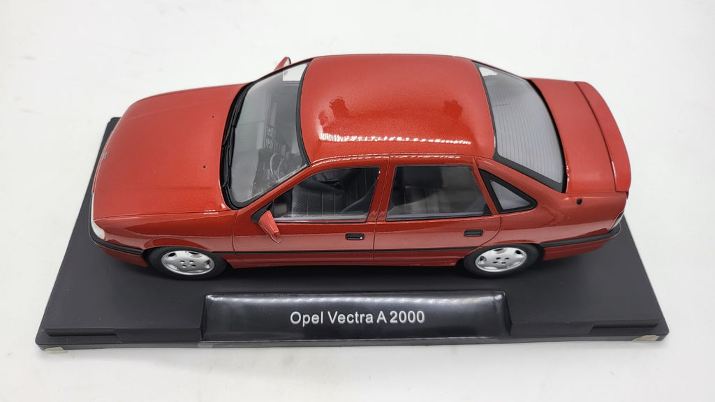 MCG: Opel Vectra A 2000 Bordeaux Rood Metallic (1990) - Schaal 1:18