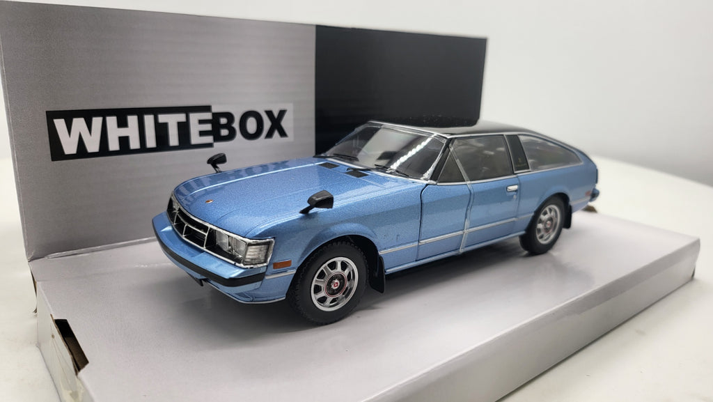 WhiteBox Toyota Celica XX, lichtblauw/zwart, 1978 - Schaal 1:24