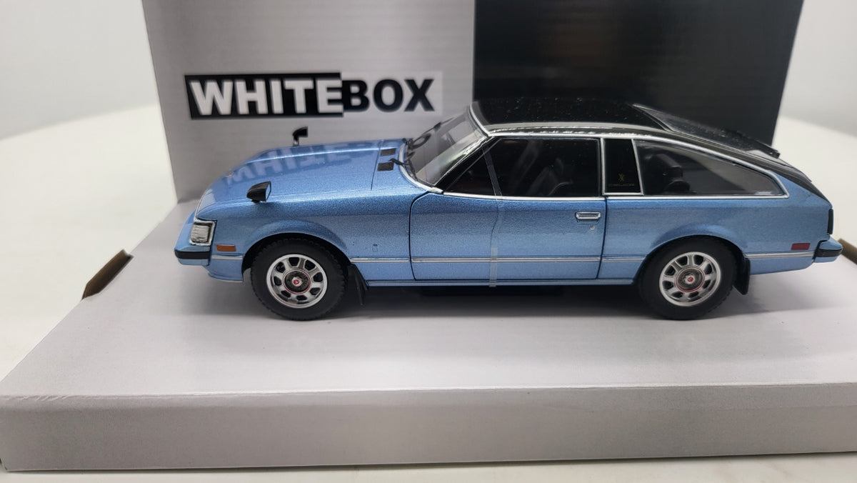 WhiteBox Toyota Celica XX, lichtblauw/zwart, 1978 - Schaal 1:24