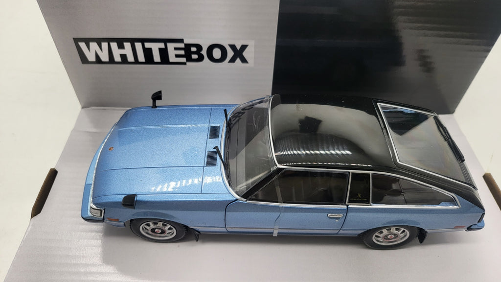 WhiteBox Toyota Celica XX, lichtblauw/zwart, 1978 - Schaal 1:24