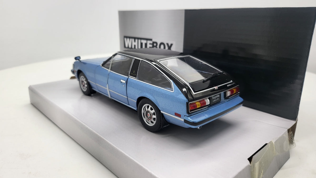 WhiteBox Toyota Celica XX, lichtblauw/zwart, 1978 - Schaal 1:24