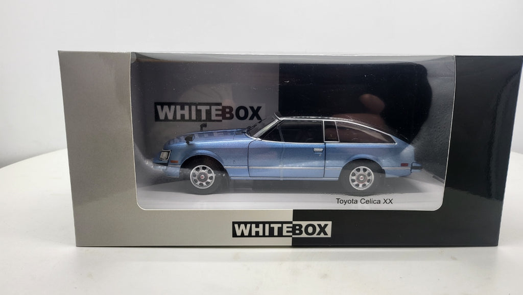 WhiteBox Toyota Celica XX, lichtblauw/zwart, 1978 - Schaal 1:24