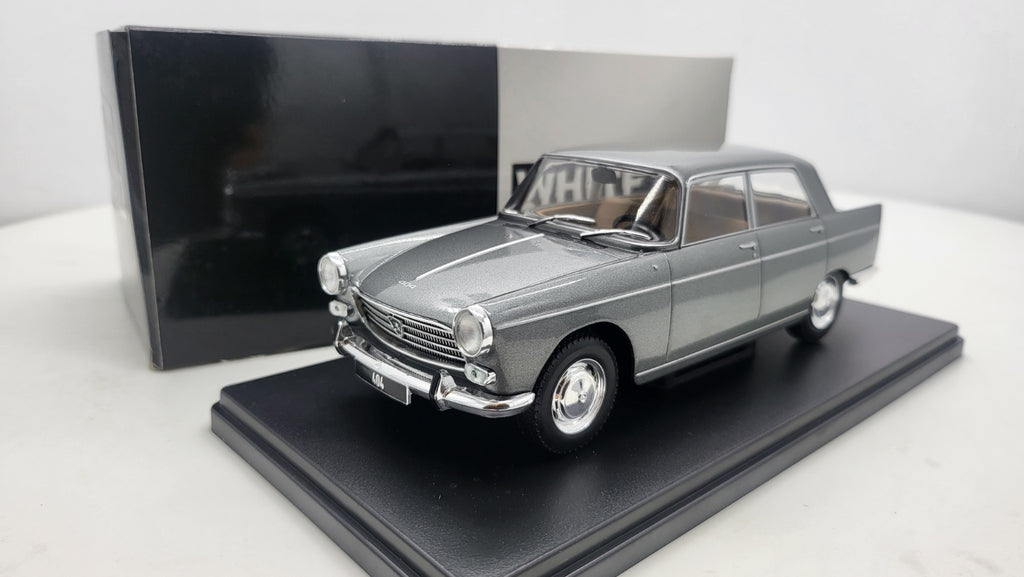 Whitebox Peugeot 404 Grijs 1960 - Schaal 1:24