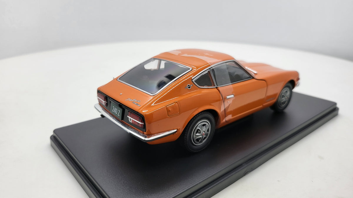 Datsun 240 Z Oranje 1969 - WhiteBox 1:24