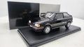 Whitebox Mazda 323 4WD Turbo Zwart/Donkergrijs 1989 - Schaal 1:24