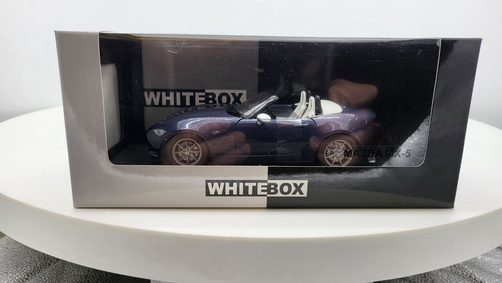 WhiteBox Mazda MX-5 Donkerblauw 2019 - Schaal 1:24