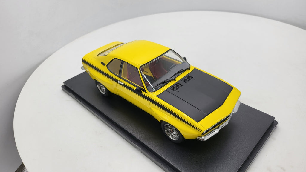 MCG: Opel Manta A Irmscher Geel/Zwart (1974) - Schaal 1:18
