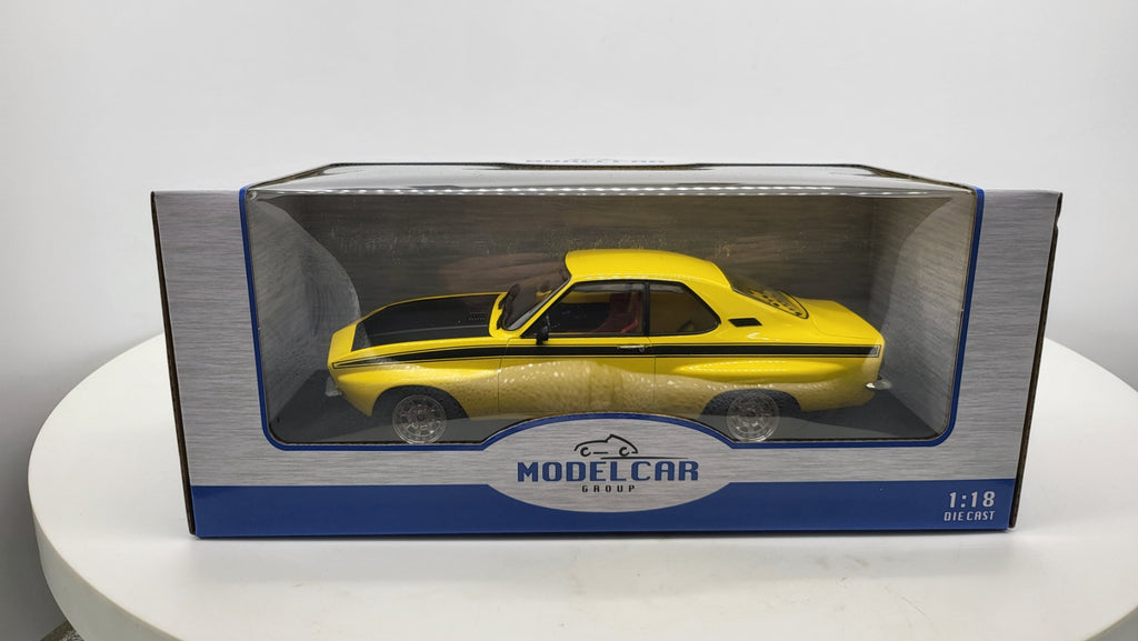 MCG: Opel Manta A Irmscher Geel/Zwart (1974) - Schaal 1:18