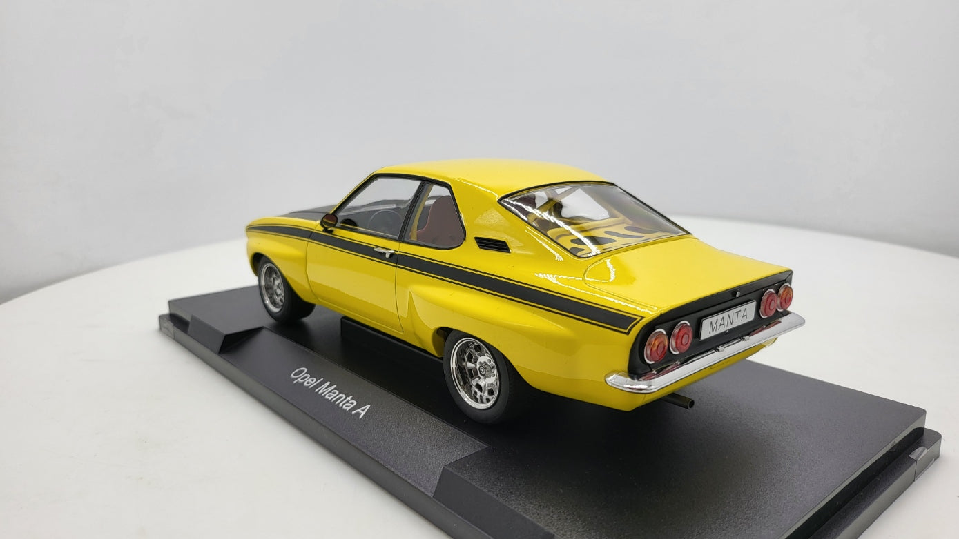 MCG: Opel Manta A Irmscher Geel/Zwart (1974) - Schaal 1:18