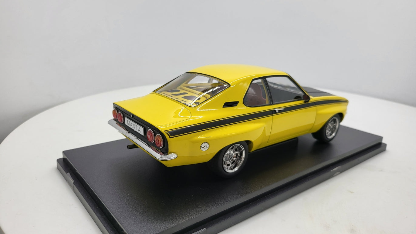 MCG: Opel Manta A Irmscher Geel/Zwart (1974) - Schaal 1:18