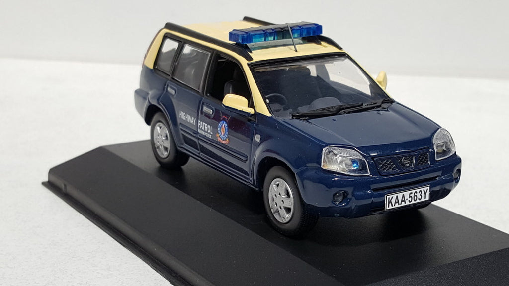 J-Collection Nissan X-Trail Kenya Highway Police Blauw 2004 - Schaal 1:43
