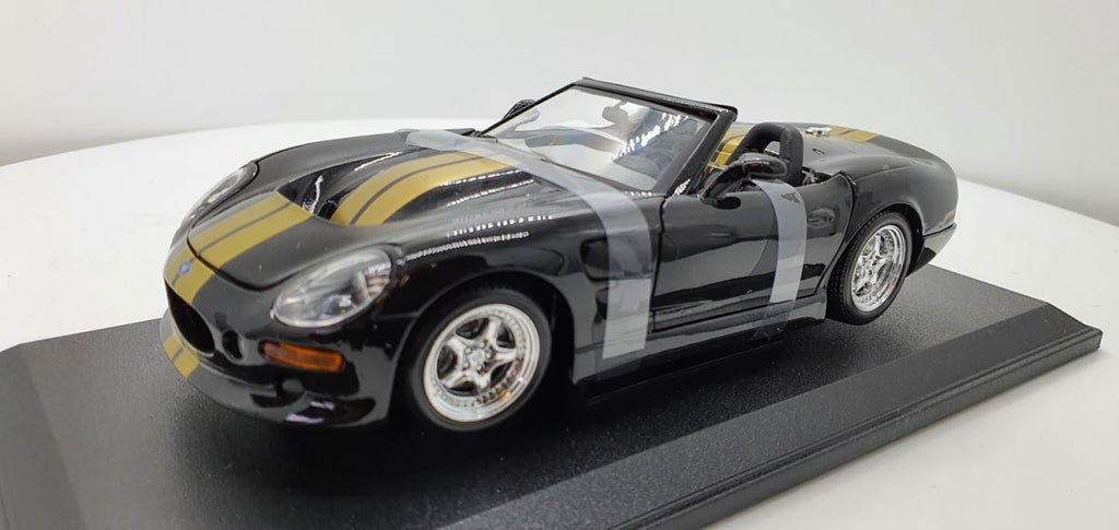 Maisto: Shelby Series 1 Zwart/Goud - Schaal 1:18