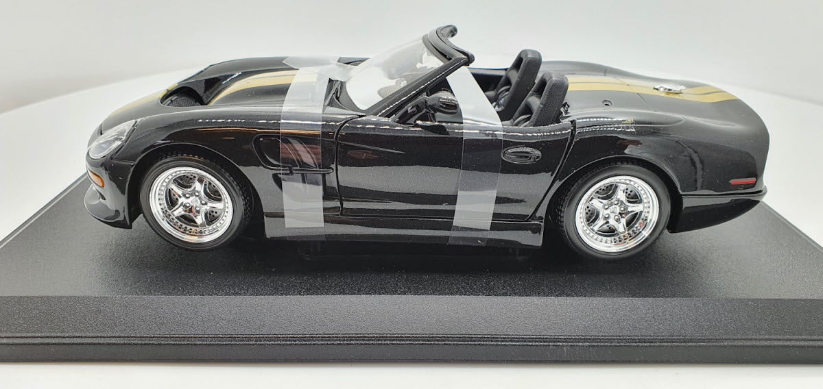 Maisto: Shelby Series 1 Zwart/Goud - Schaal 1:18