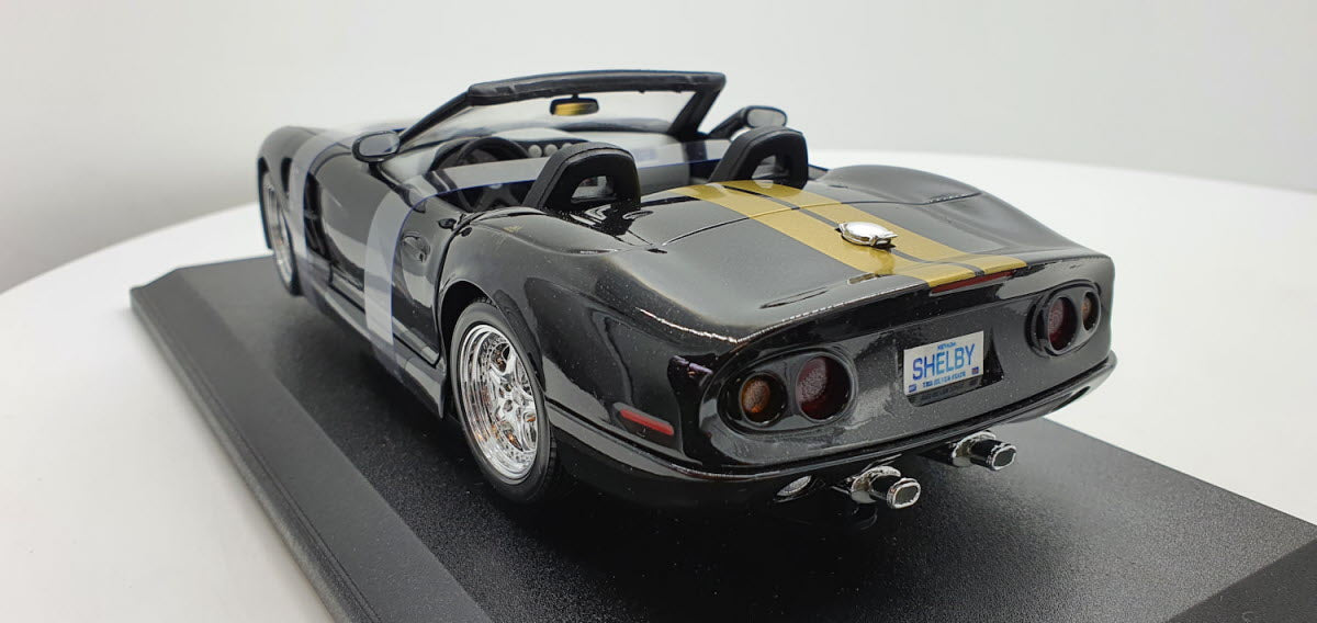 Maisto: Shelby Series 1 Zwart/Goud - Schaal 1:18