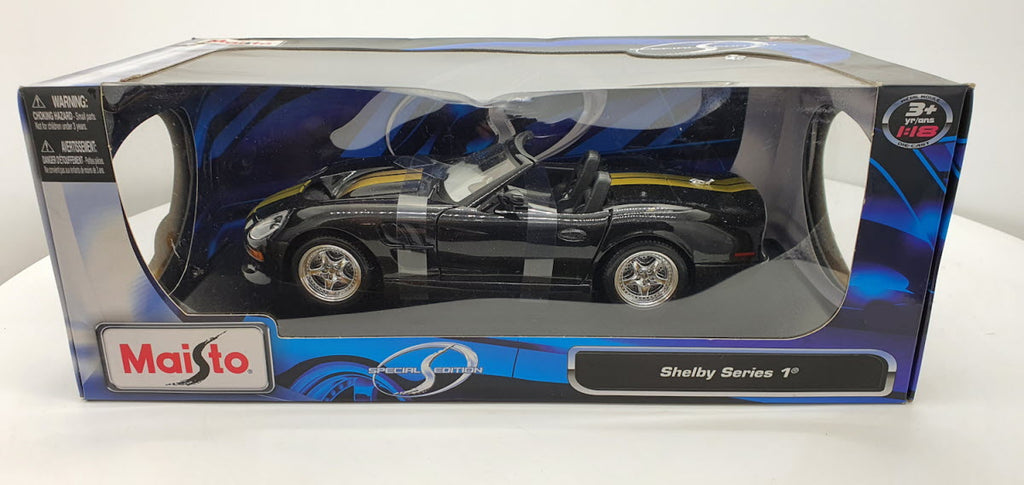 Maisto: Shelby Series 1 Zwart/Goud - Schaal 1:18
