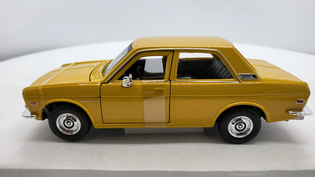 Maisto Datsun 510 Geel 1971 - Schaal 1:24