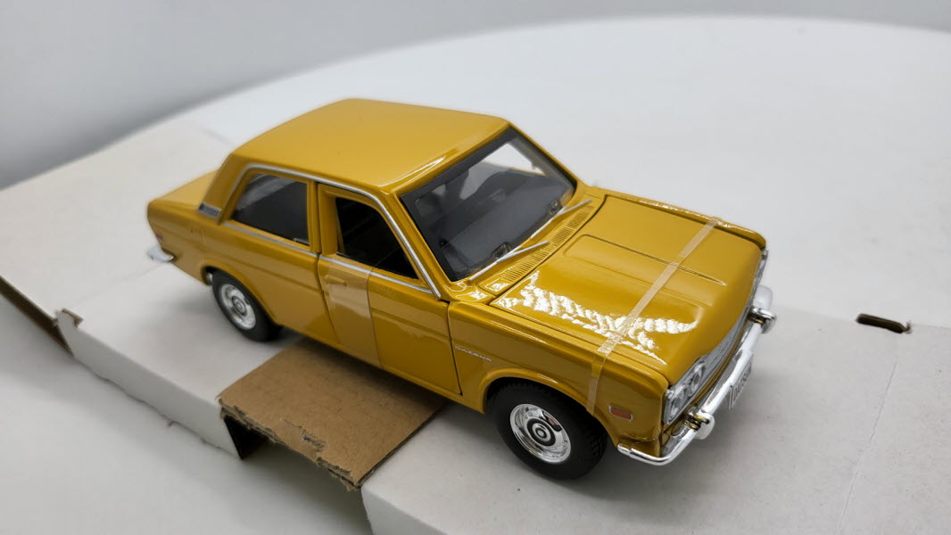 Maisto Datsun 510 Geel 1971 - Schaal 1:24