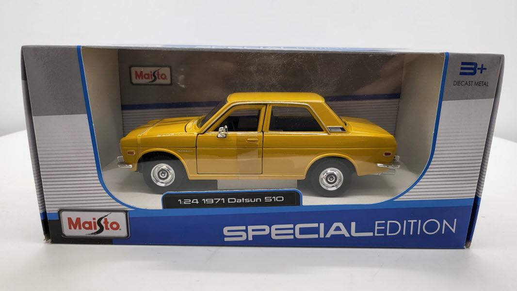 Maisto Datsun 510 Geel 1971 - Schaal 1:24